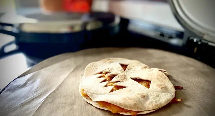 Halloween Tortilla Pumpkin Toasties with Cheesy Roasted Squash Filling